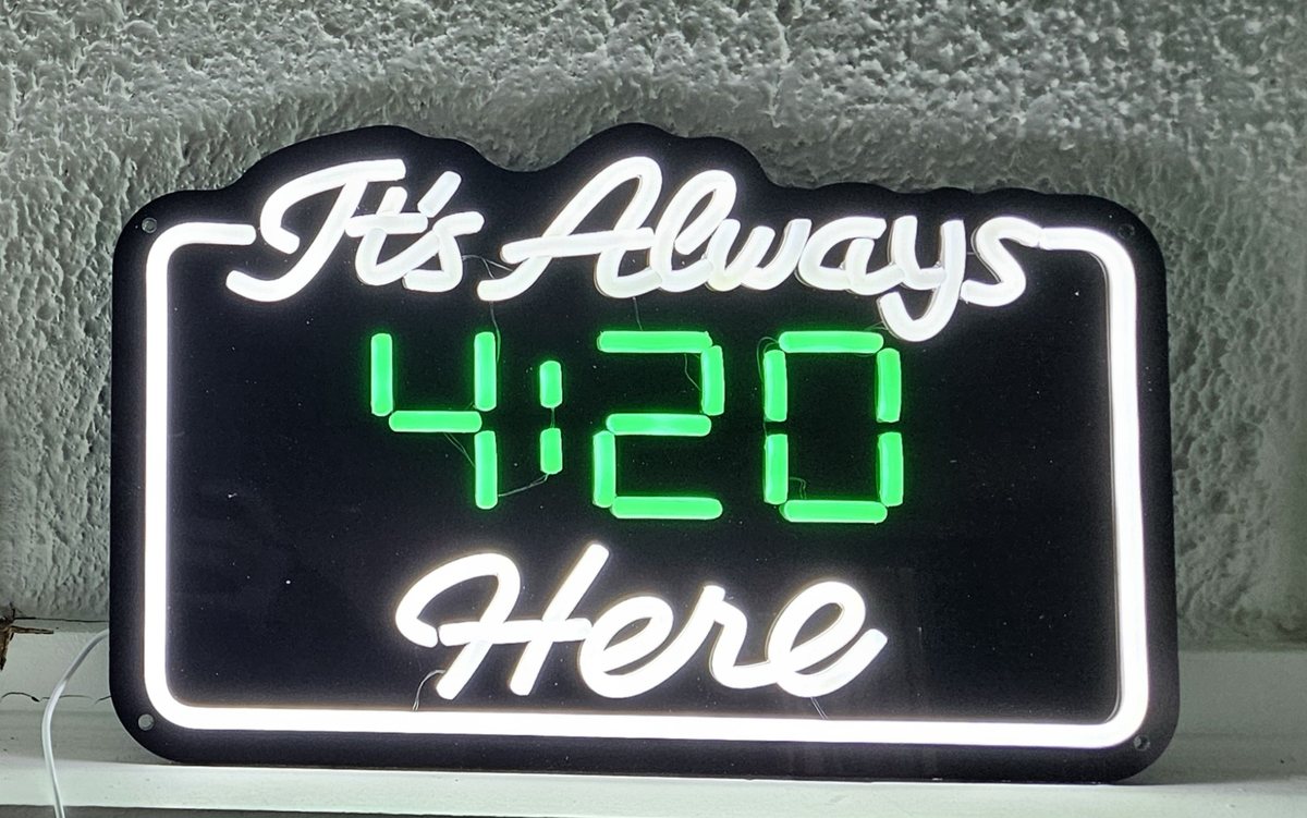 It's Always 4:20 Here neon LED sign glowing green and white